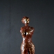 1988 Nudo di donna. Bronzo patinato, 14.5x38x9.5